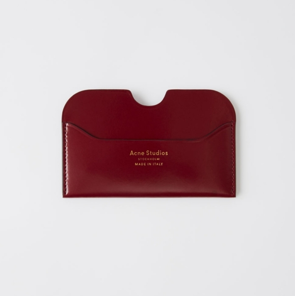 Acne Studios Handbags - Acne Studios burgundy card holder New in the box